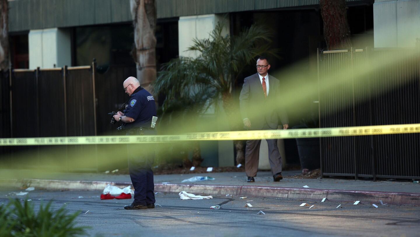 An investigation is underway outside the Stingers Bar and Nightclub in San Bernardino on Wednesday morning after two people were killed and five wounded by gunfire.