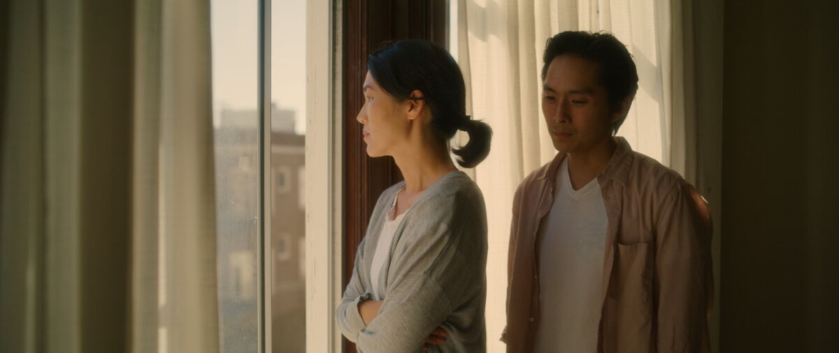 Jackie Chung and Justin Chon in the movie "Coming Home Again."