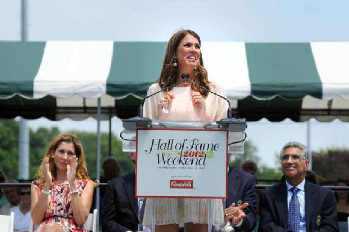 Jennifer Capriati gives her induction speech at the Tennis Hall of Fame on Saturday.