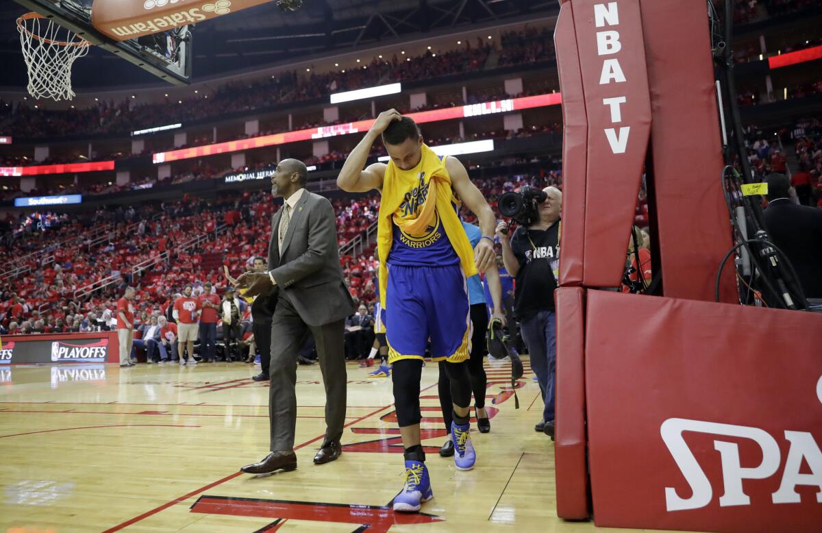 Warriors guard Stephen Curry heads to the locker room at the start of the second half in Game 4.