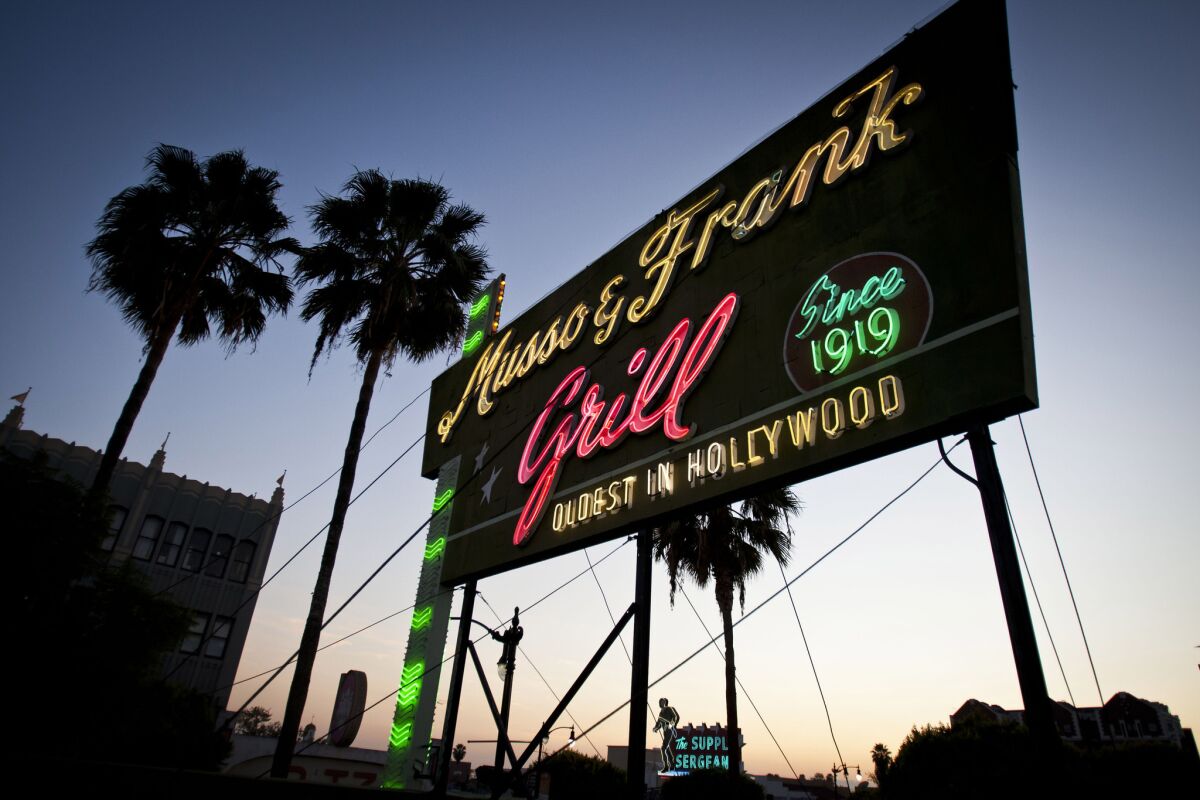 Musso & Frank's sign lights up the Hollywood sky