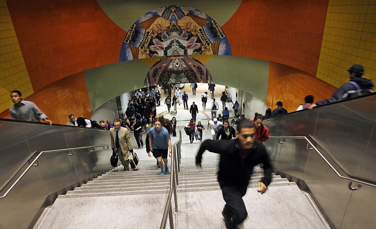 Commuters stream through North Hollywood's Metro Red Line Station, the creation of which helped the arts district take off in a big way.