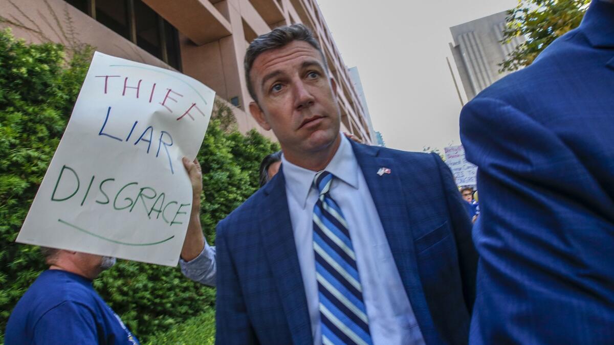 Rep. Duncan Hunter (R-Alpine) leaves a federal courthouse in San Diego last month after pleading not guilty to charges of illegally using his campaign account for personal expenses.