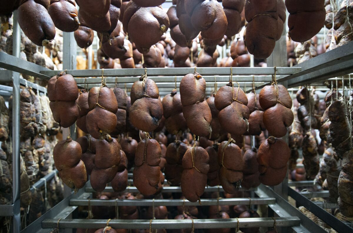 ’Nduja is smoked and cured in temperature-controlled environments.