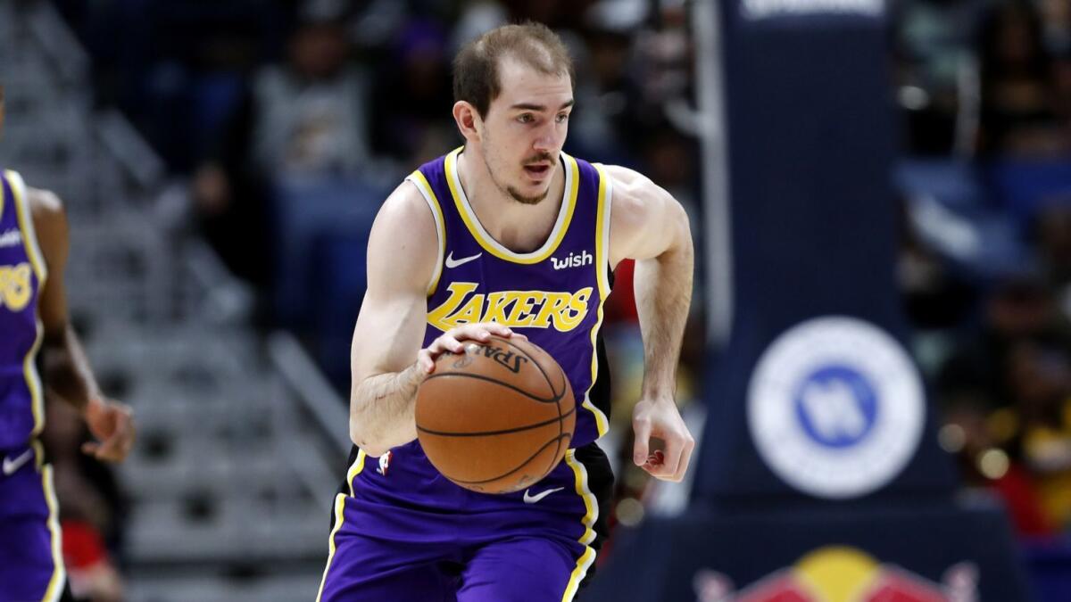 Alex Caruso of the Lakers dribbles against New Orleans.