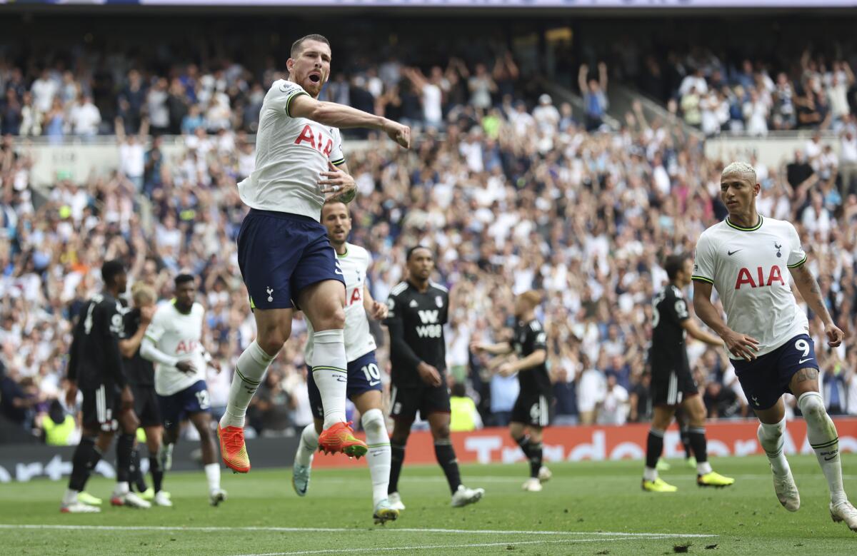 Tottenham's Pierre-Emile Hojbjerg celebrates after scoring his side's opening goal during the English Premier League soccer match between Tottenham Hotspur and Fulham at Tottenham Hotspur stadium, in London, England, Saturday, Sept. 3, 2022. (AP Photo/Ian Walton)