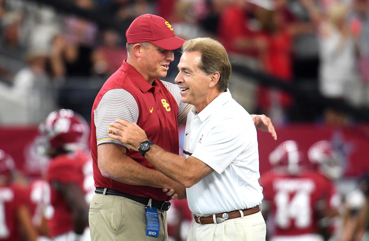 USC Coach Clay Helton and Alabama Coach Nick Saban were all smiles before their teams' season-opening showdown.