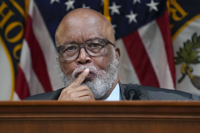 FILE - Chairman Bennie Thompson, D-Miss., listens as the House select committee investigating the Jan. 6 attack on the U.S. Capitol holds a hearing at the Capitol in Washington, June 28, 2022. The House committee investigating the Jan. 6 attack will make criminal referrals to the Justice Department. That's according to the panel’s chairman Bennie Thompson of Mississippi. (AP Photo/J. Scott Applewhite, File)