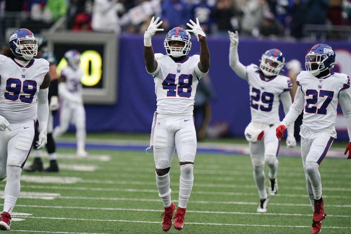 Giants' defense smothers Eagles 13-7, gets 3 picks - The San Diego