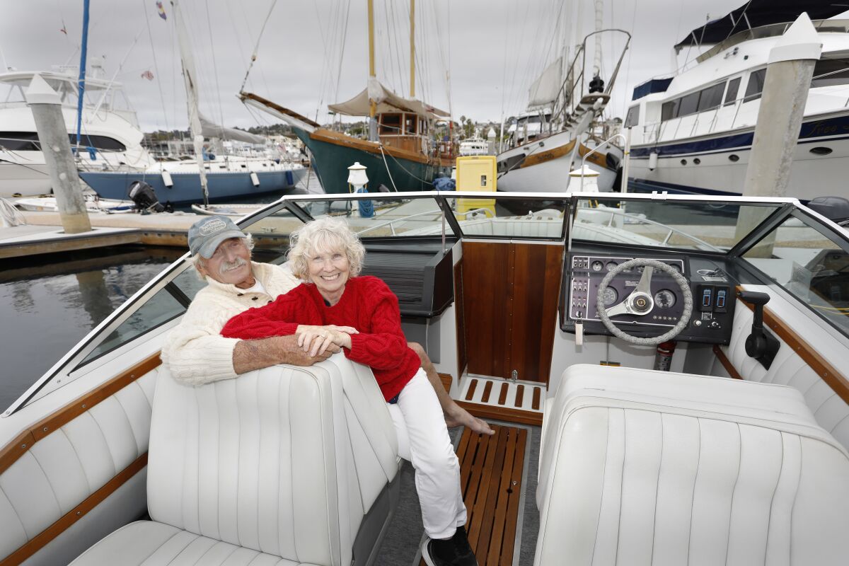Leland Parsons, left and wife Cecily Parsons, sit in their Cobalt powerboat at Sun Harbor Marine. 