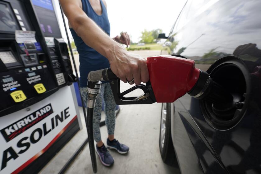 FILE - A customer readies to pump gas at this Ridgeland, Miss., Costco, Tuesday, May 24, 2022. The Labor Department is expected to report consumer prices on Thursday, Nov. 10. (AP Photo/Rogelio V. Solis, File)