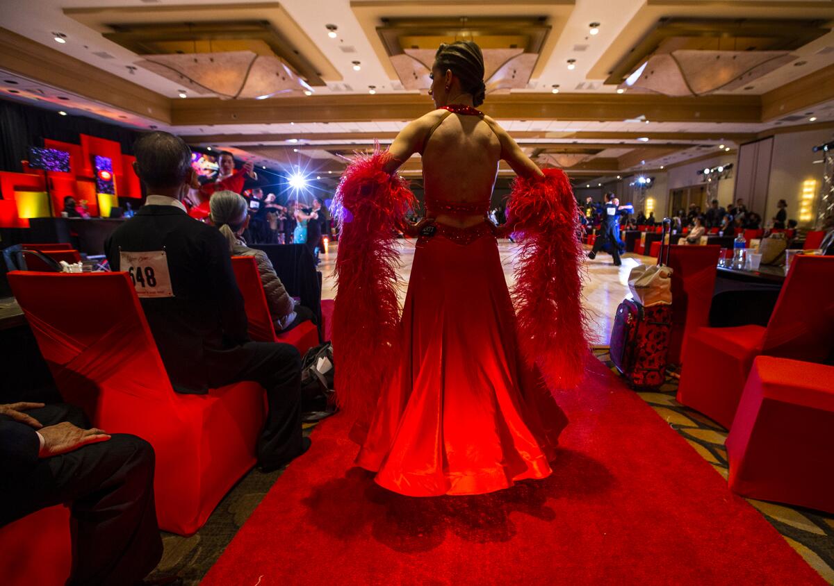 Amy Jennings, of Arizona, looks out at the dance floor Friday during the California Open DanceSport Championships.