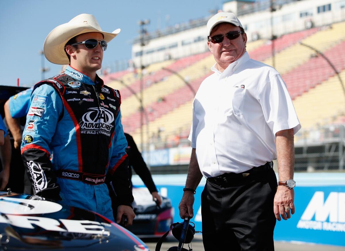 Austin Dillon, left, talks with his grandfather, NASCAR team owner Richard Childress, during qualifying for the Nationwide Series Zippo 200 on Saturday.