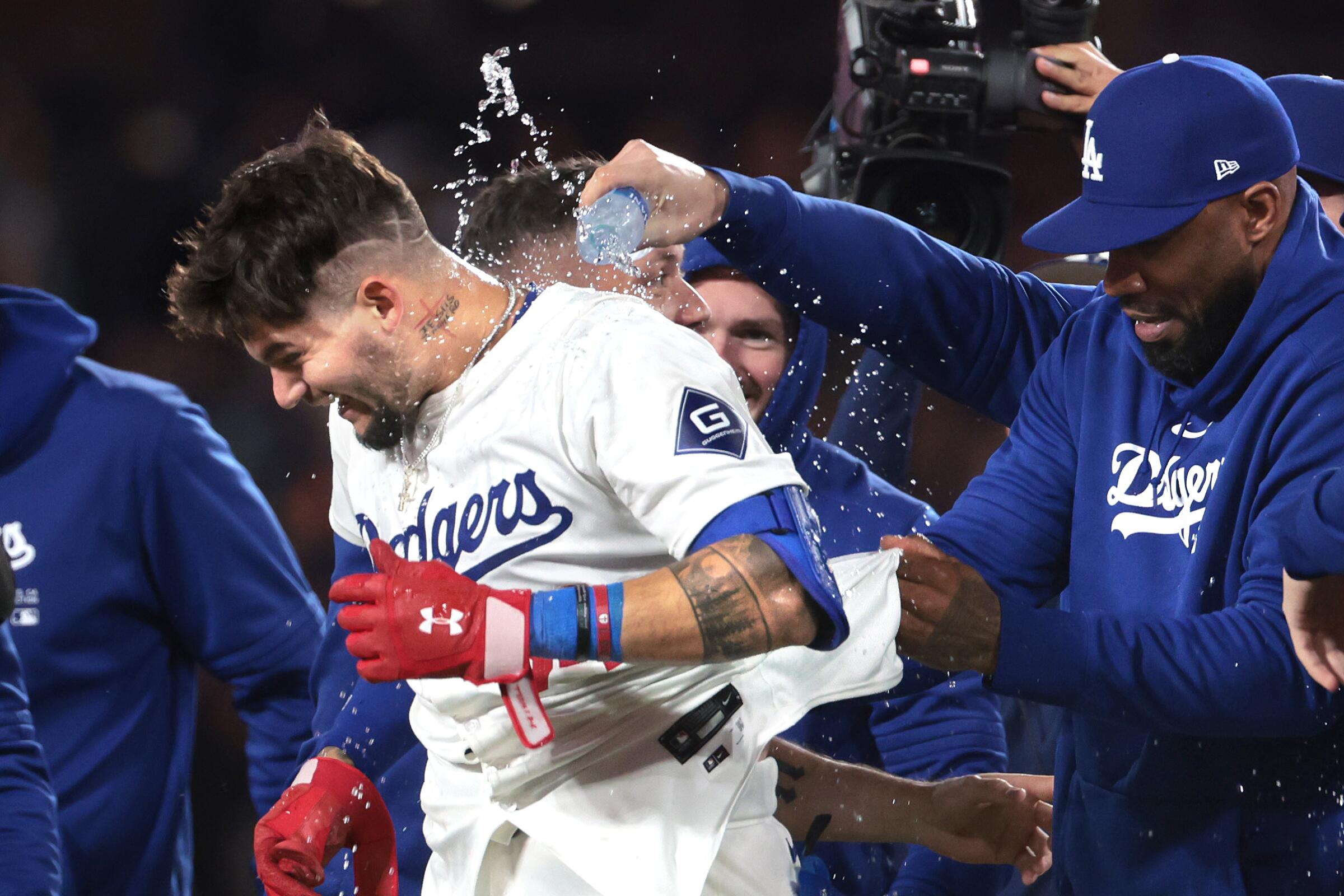 Dodgers rookie Andy Pages celebrates with teammates after hitting a walk-off single.