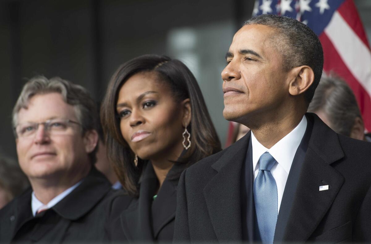 President Obama, First Lady Michelle Obama and Ted Kennedy Jr. attend the dedication of the Edward M. Kennedy Institute for the U.S. Senate in Boston on Monday.