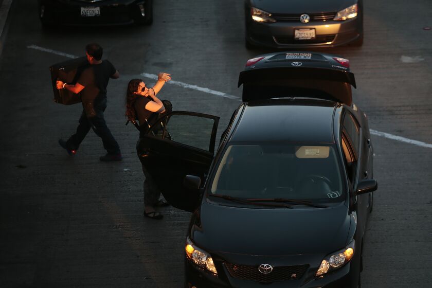 LOS ANGELES, CA, TUESDAY, OCTOBER 20, 2015 - Uber cars drop off passengers at LAX Terminal One. (Robert Gauthier/Los Angeles Times)