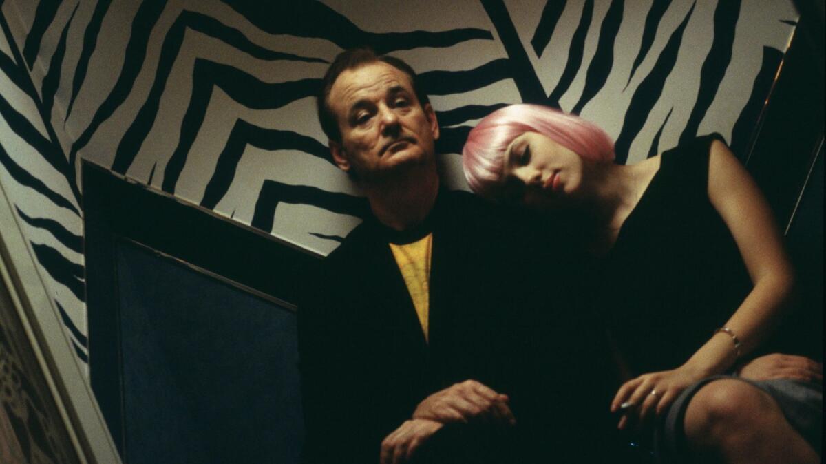 The wallpaper behind Bill Murray and Scarlett Johansson in a scene from Sofia Coppola's 2003 film "Lost in Translation" inspired a print under consideration for the spring 2018 William Murray Golf collection. (Yoshio Sato / Focus Features)