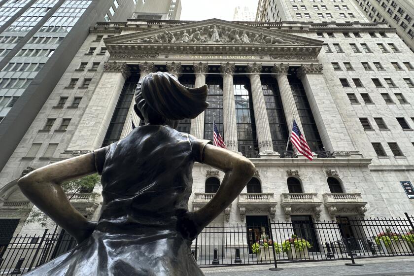 The Fearless Girl statue stands in front of the New York Stock Exchange on Wednesday, June 26, 2024 in New York. Shares have advanced in Europe and Asia after a rebound for Nvidia offset weakness on Wall Street. (AP Photo/Peter Morgan)