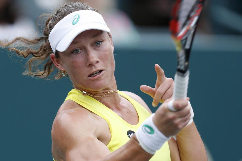 Samantha Stosur hits a return during a match against Sesil Karatantcheva at the Family Circle Cup in Charleston, S.C., on April 7, 2015.