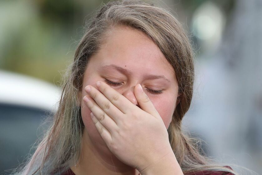 PARKLAND, FL - FEBRUARY 15: Student Kelsey Friend, becomes emotional while recounting her story about yesterday's mass shooting at the Marjory Stoneman Douglas High School where 17 people were killed, on February 15, 2018 in Parkland, Florida. Police arrested the suspect after a short manhunt, and have identified him as 19 year old former student Nikolas Cruz. (Photo by Mark Wilson/Getty Images) ** OUTS - ELSENT, FPG, CM - OUTS * NM, PH, VA if sourced by CT, LA or MoD **