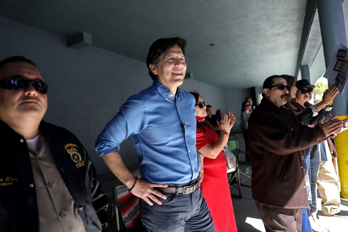 Kevin de León, center, and others at his mayoral headquarters in Los Angeles.