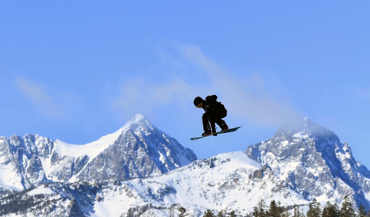 MAMMOTH, CALIFORNIA JANUARY 1, 2018-A competitor launches off a ramp during the Men's Slopestyle Qualifier in Mammoth Mountain Saturday. (Wally Skalij/Los Angeles Times)