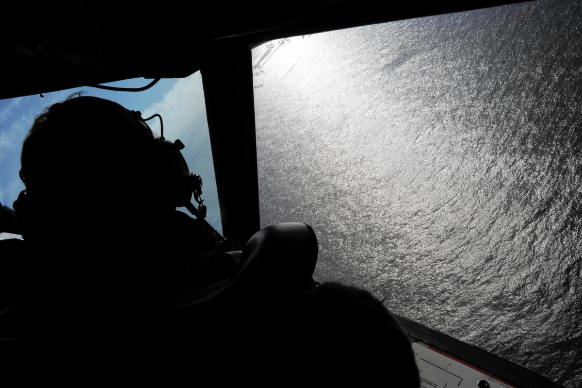 A Royal New Zealand Air Force craft flies over the Indian Ocean in April during the search for Malaysia Airlines Flight 370. Australia is continuing the search off Perth.
