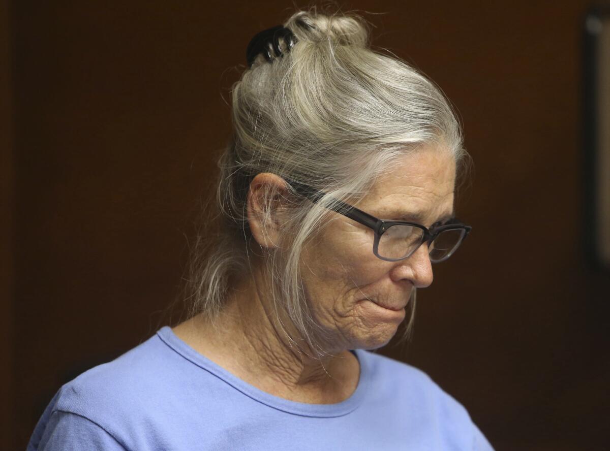 Leslie Van Houten reacts after hearing she is eligible for parole during a hearing in 2017.