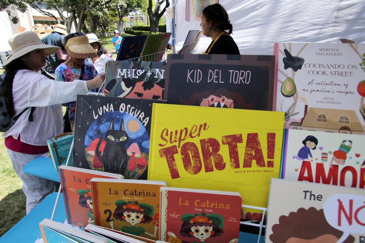 A variety of Spanish written themed books on display in the Los Angeles Times en Espanol stage area 
