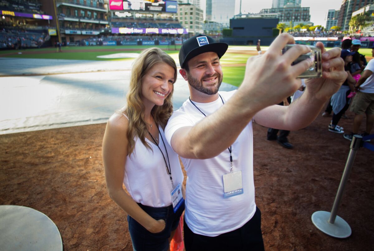 A photo of September blind daters Tom and Kristle  on a blind date at Petco Park. 