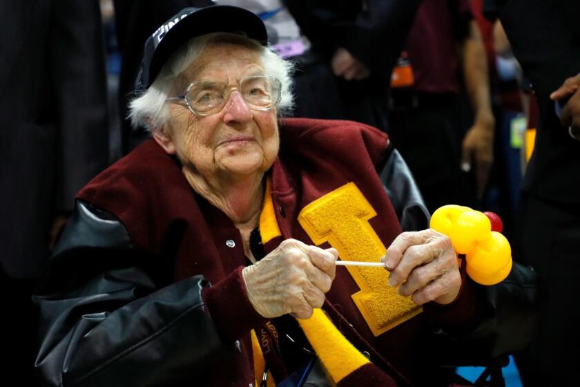 ATLANTA, GA - MARCH 24: Sister Jean Dolores Schmidt celebrates with the Loyola Ramblers after defeating the Kansas State Wildcats during the 2018 NCAA Men's Basketball Tournament South Regional at Philips Arena on March 24, 2018 in Atlanta, Georgia. Loyola defeated Kansas State 78-62 (Photo by Kevin C. Cox/Getty Images) ** OUTS - ELSENT, FPG, CM - OUTS * NM, PH, VA if sourced by CT, LA or MoD **