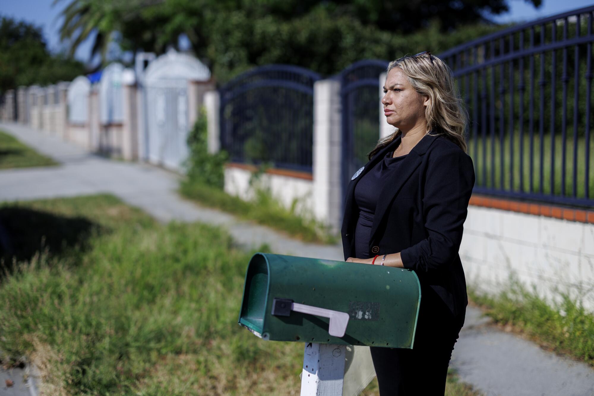 Vanessa Perez stands at the location where her son, Joseph Perez, was beaten by L.A. County sheriff's deputies in July 2020.