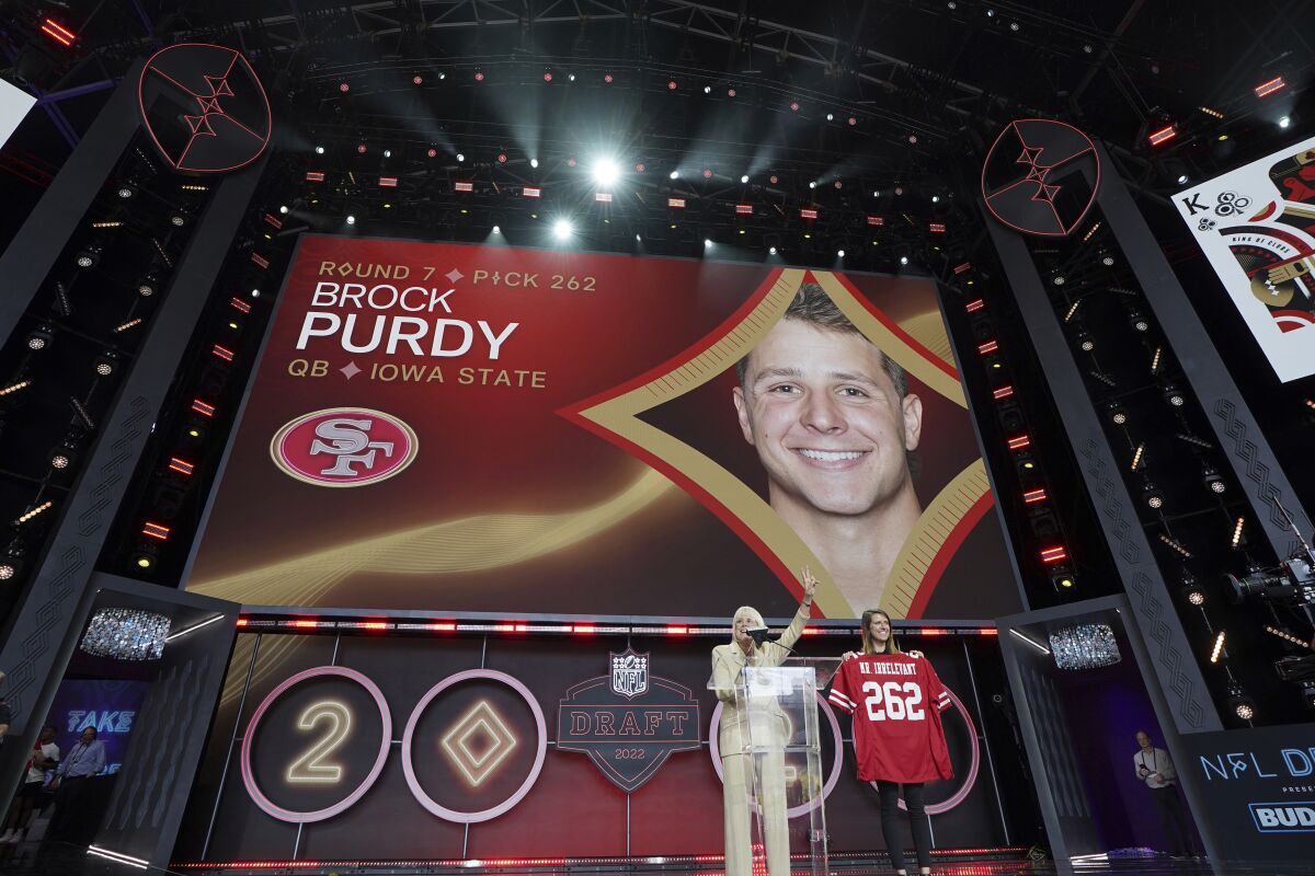 FILE - Iowa State quarterback Brock Purdy gets picked as Mr. Irrelevant by the San Francisco 49ers as the 262nd and last pick of the 2022 NFL Draft on Saturday, April 30, 2022, in Las Vegas. With one more win for the 49ers, Purdy will be the first rookie QB to start in a Super Bowl. (AP Photo/Doug Benc, File)