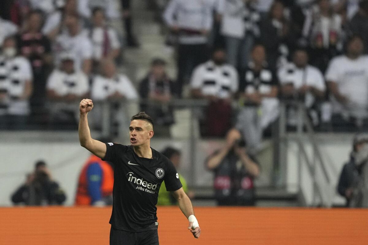 Frankfurt's Rafael Santos Borre celebrates after scoring his sides first goal during the Europa League semi final second leg soccer match between Eintracht Frankfurt and West Ham United in Frankfurt, Germany, Thursday, May 5, 2022. (AP Photo/Michael Probst)