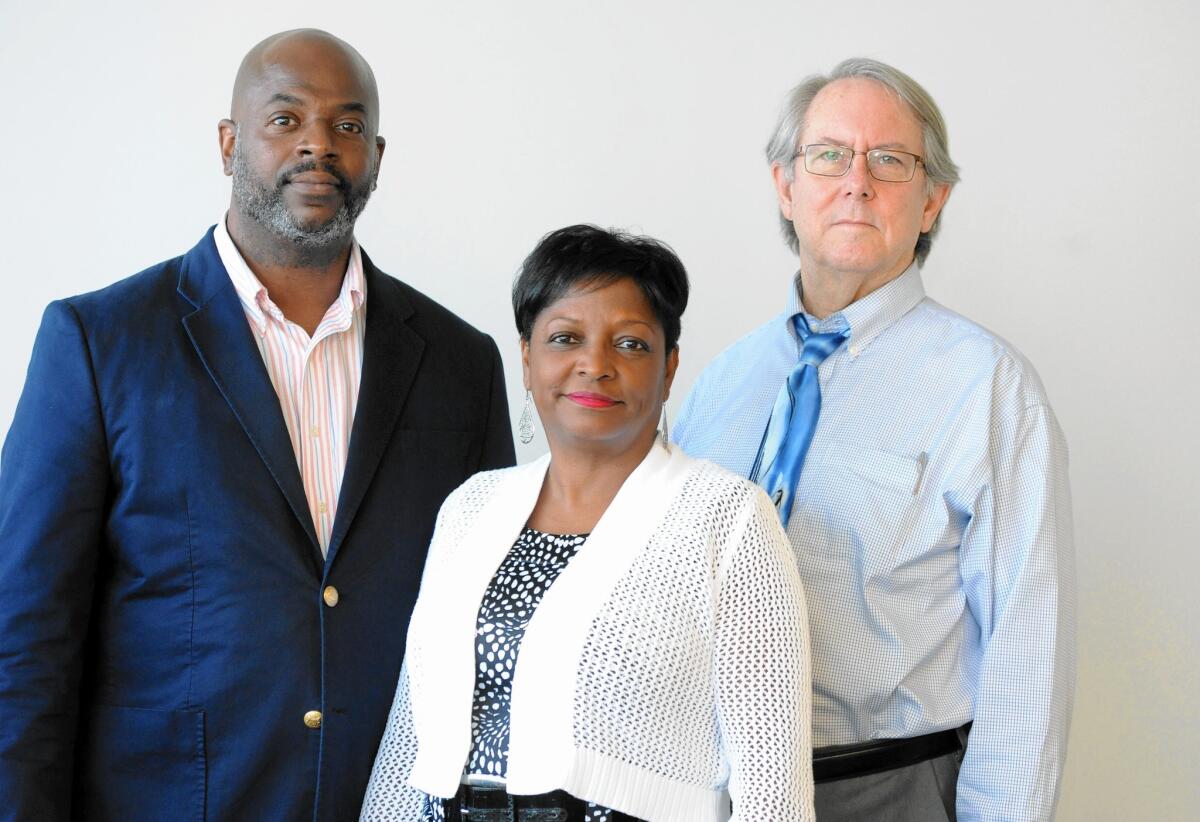 Aaron Bryant, Deborah Tulani Salahu-Din and William Pretzer, from left, of the Smithsonian Institution's National Museum of African American History and Culture, set to open next year.