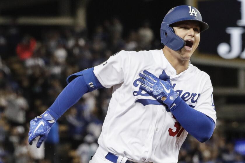 LOS ANGELES, CA, THURSDAY, OCTOBER 3, 2019 - Los Angeles Dodgers left fielder Joc Pederson (31) celebrates after homering in the eighth inning in game one of the National League Division Series at Dodger Stadium. (Robert Gauthier/Los Angeles Times)