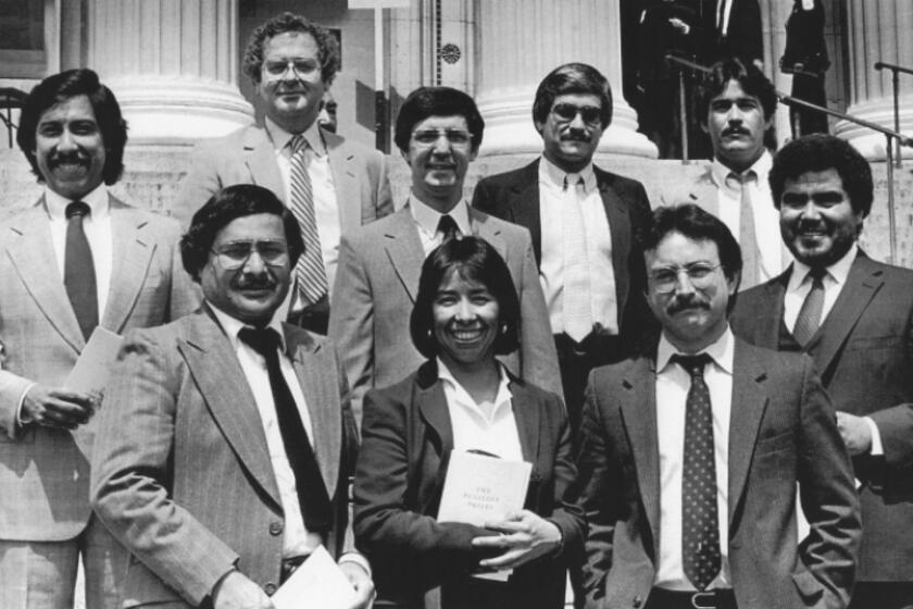 Bottom row, from left: David Reyes, Virginia Escalante and Louis Sahagun. Top row, from left: George Ramos, Noel Greenwood, Frank Sotomayor, Frank del Olmo, Jose Galvez and Robert Montemayor at the Pulitzer Prize ceremony in New York.