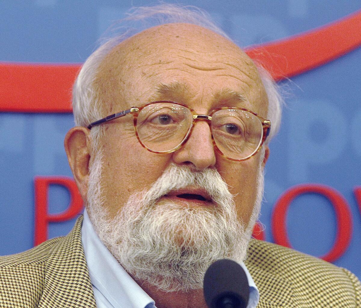 Polish composer Krzysztof Penderecki at a 2013 news conference in Warsaw. Sources close to the family say that Penderecki died Sunday at the age of 86 after a "long and serious illness."