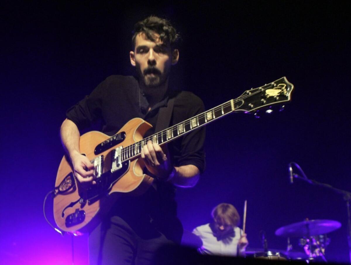 Taylor Rice, left, and Matt Frazier of the L.A. band Local Natives perform at the Fonda in Hollywood on Jan. 28, 2013.