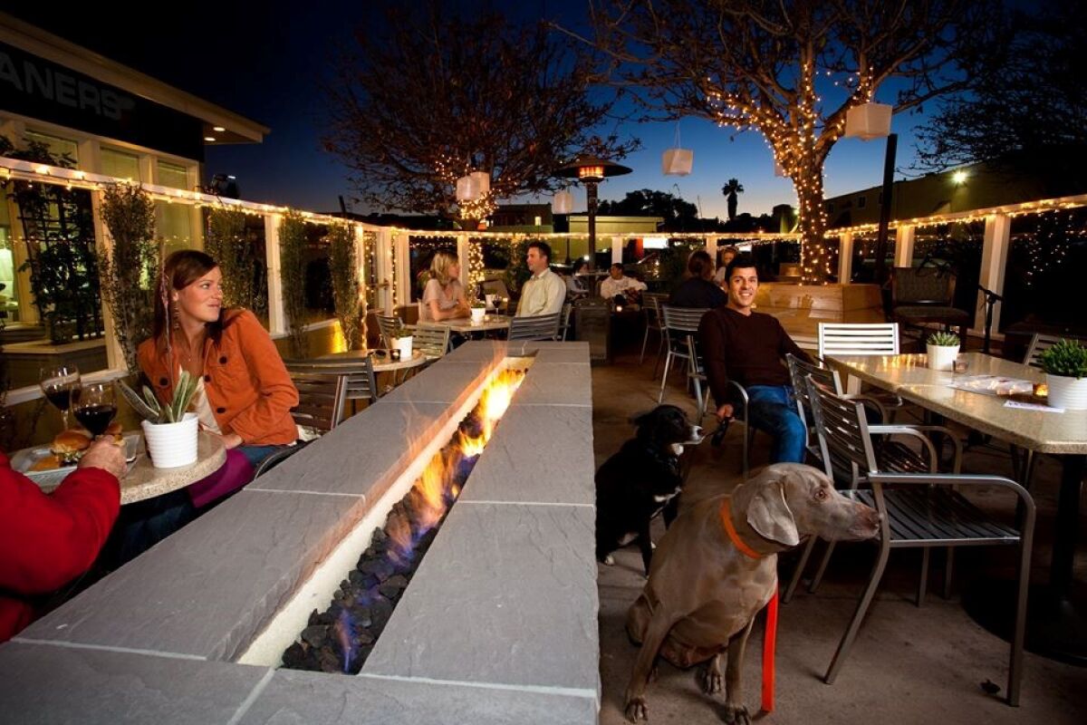 Every neighborhood should have a patio gathering spot like the one at The Wine Pub.