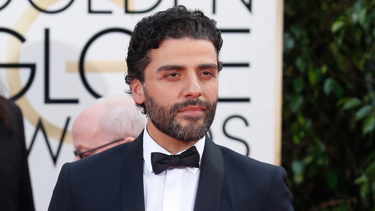 Oscar Isaac at the 2016 Golden Globe Awards at the Beverly Hilton Hotel.