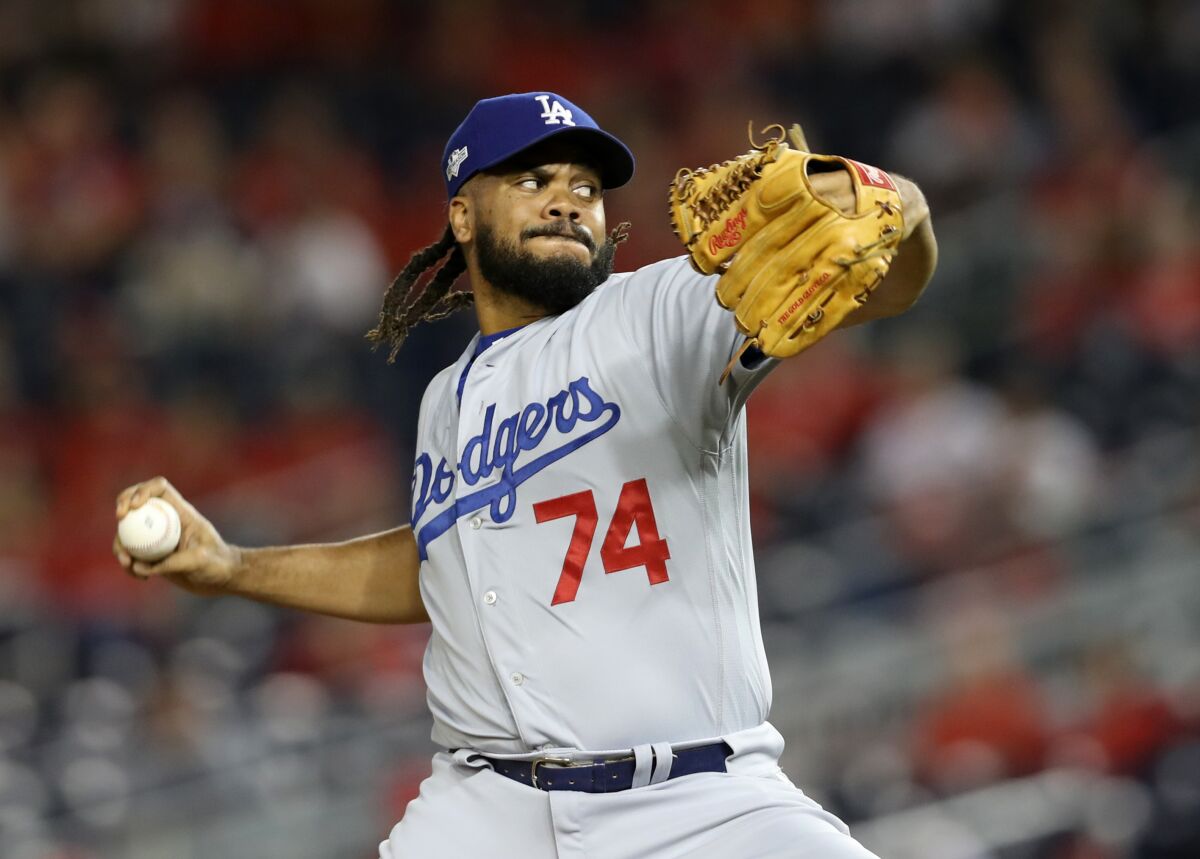Kenley Jansen pitches in the ninth inning of Game 3 of the National League Division Series against the Washington Nationals.
