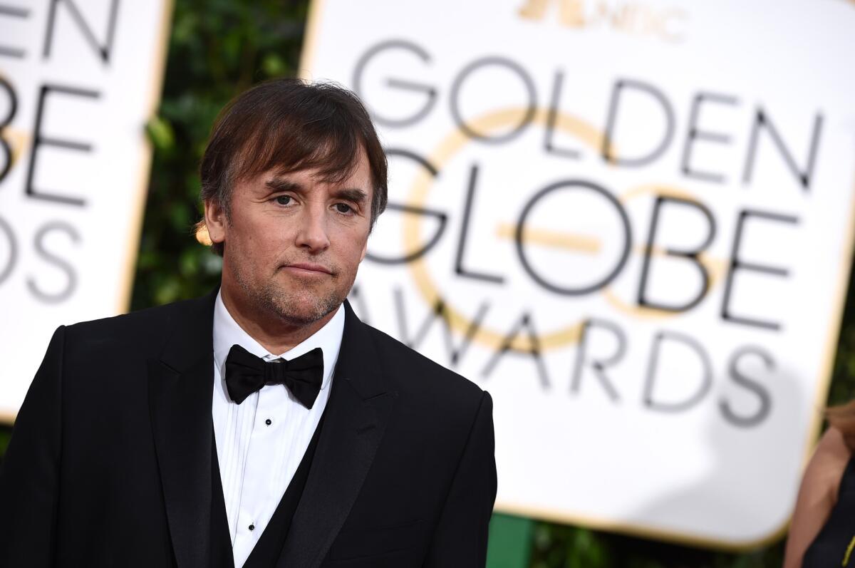 Richard Linklater arrives at the 72nd Golden Globes at the Beverly Hilton Hotel on Sunday before winning the award for motion picture director.