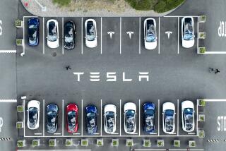 FREMONT, CALIFORNIA - APRIL 20: In an aerial view, Tesla cars sit parked in a lot at the Tesla factory on April 20, 2022 in Fremont, California. Tesla reported first quarter earnings that far exceeded analyst expectations with revenue of $18.76 billion compared to expectations of $17.80 billion. (Photo by Justin Sullivan/Getty Images)