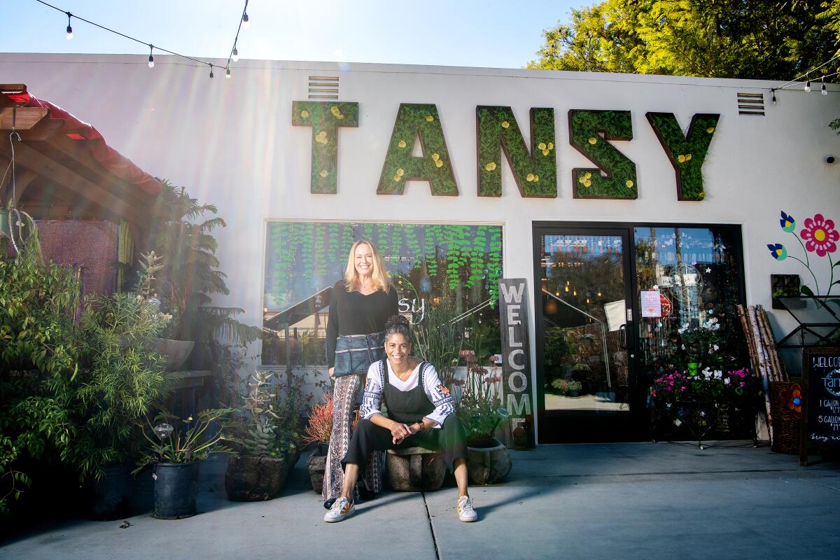 Colette Fowler, left, and Shawna Christian at their plant shop Tansy. 