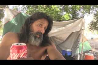 NY homeless man holding an LV bag pulled from a trash can. A few feet away  street vendors sold replicas to tourists. If homelessness was…