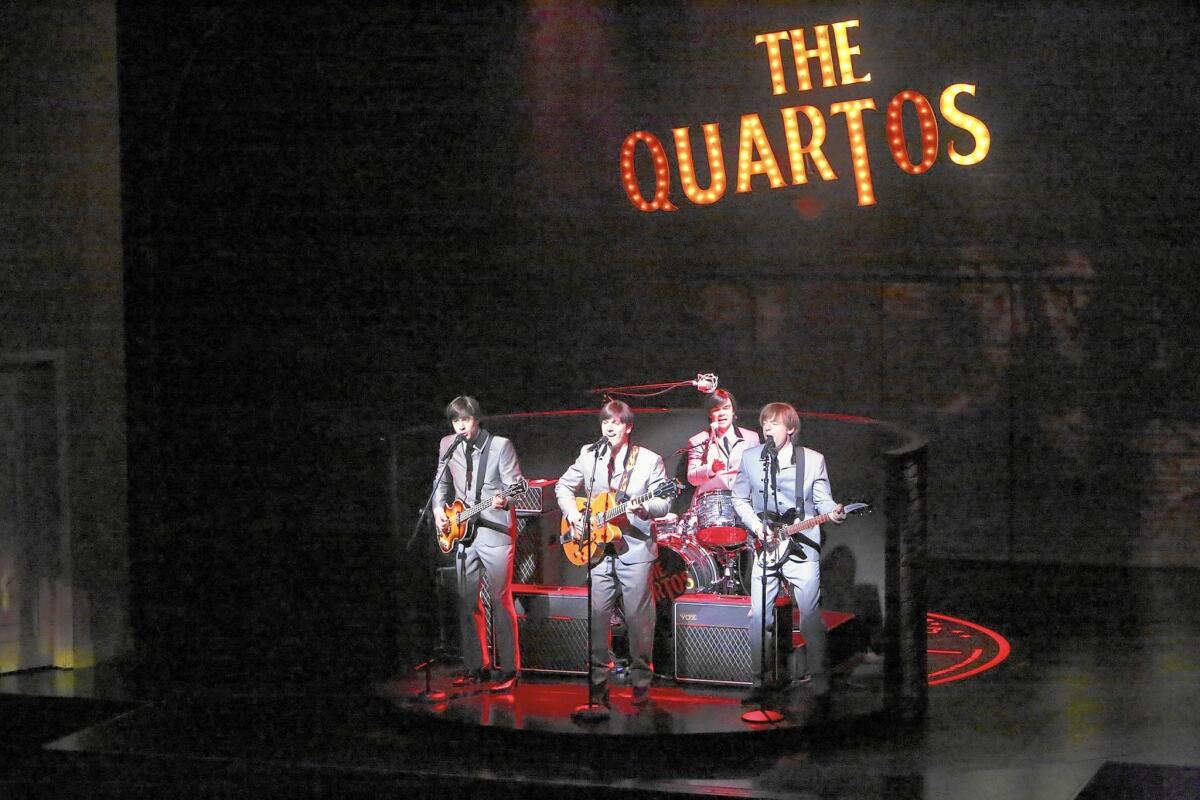 The Quartos perform -- Claude (Damon Daunno), Balth (Lucas Papaelias), Pedro (James Barry) and Ben (Justin Kirk) -- in a scene from the play "These Paper Bullets!"