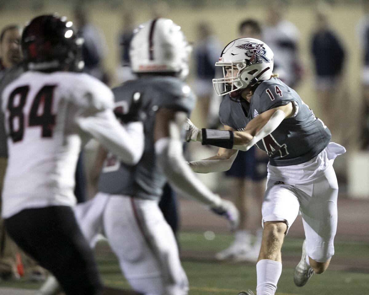 Scripps Ranch High receiver Conor Lawlor reaches for a catch.
