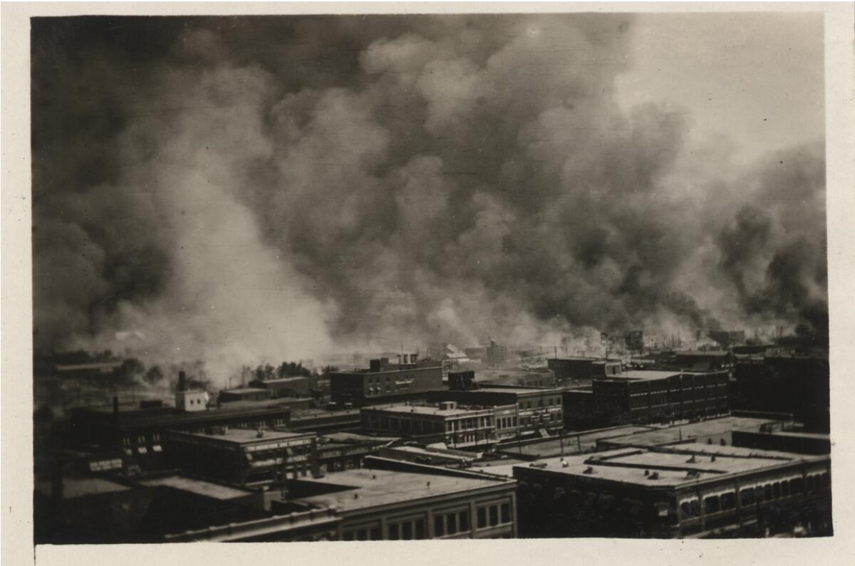 Greenwood on fire, Tulsa, June 1, 1921. From "The Ground Breaking" by Scott Ellsworth.