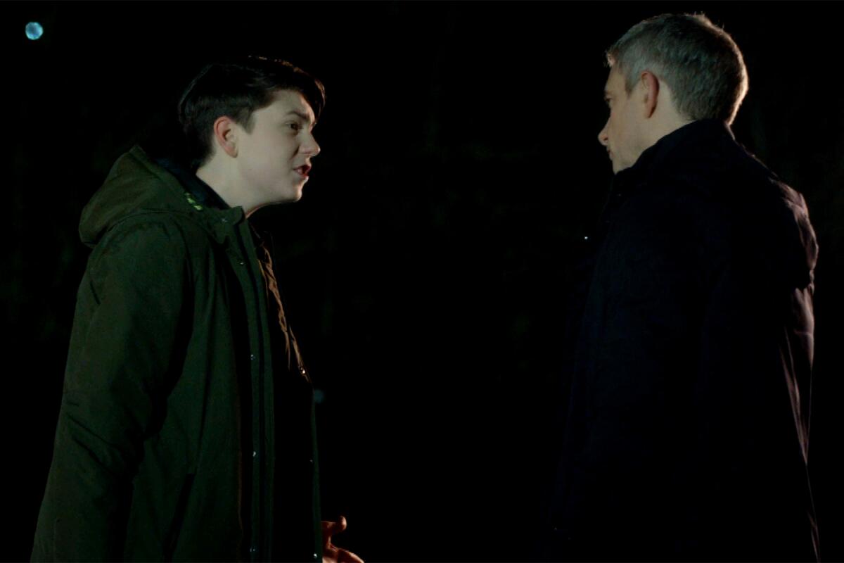 Alex Eastwood, left, and Martin Freeman in a night scene on "Breeders" on FX.